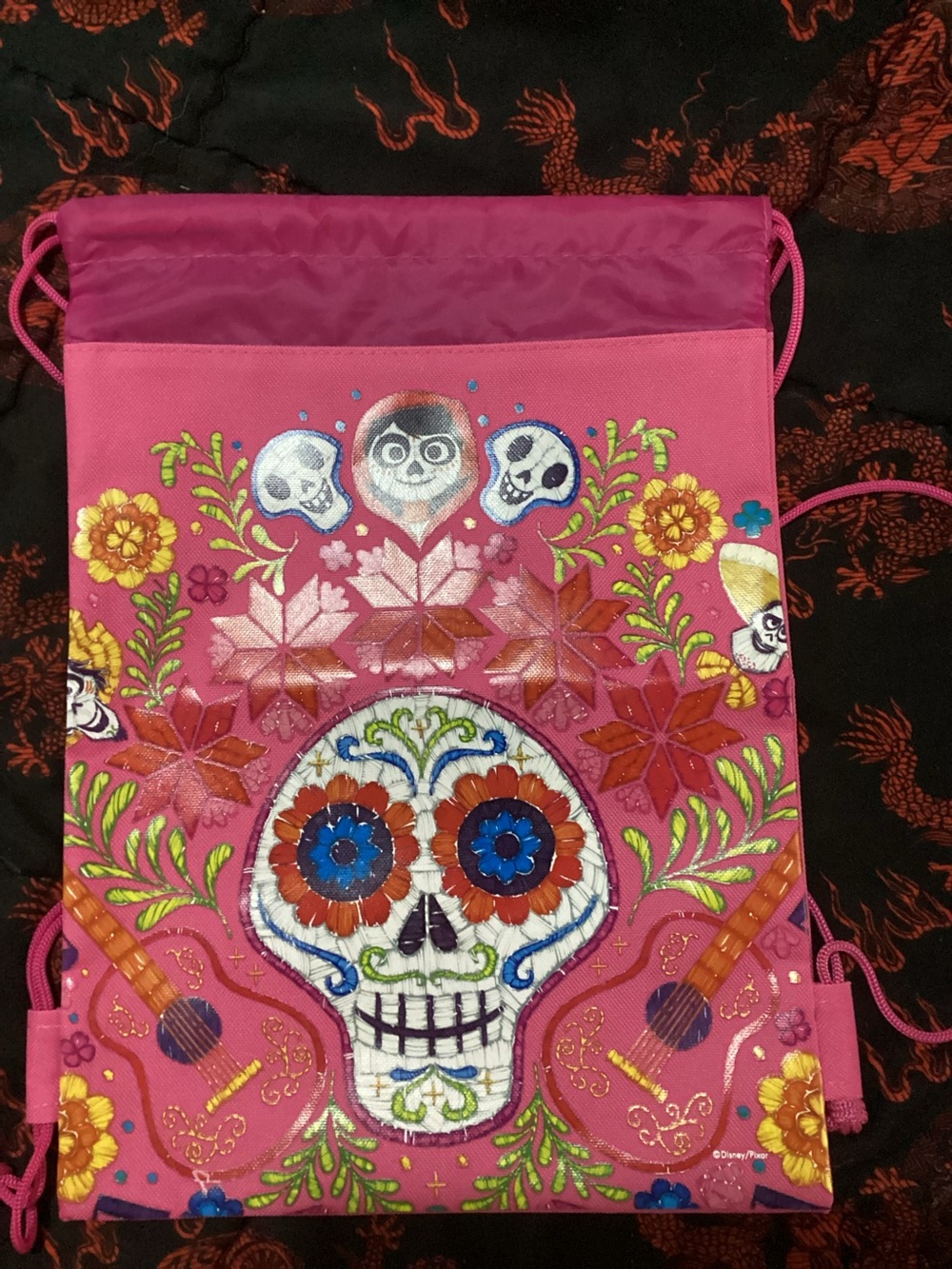 Disneys coco- Pink Embroidered Dia de los Muertos Drawstring Backpack